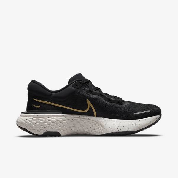 Men's Nike ZoomX Invincible Run Flyknit Road Running Shoes Black / Metal Gold | NK895SLW