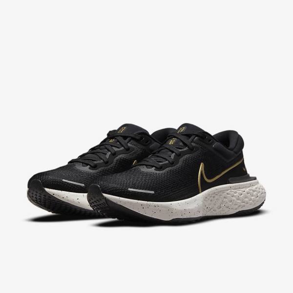 Men's Nike ZoomX Invincible Run Flyknit Road Running Shoes Black / Metal Gold | NK895SLW