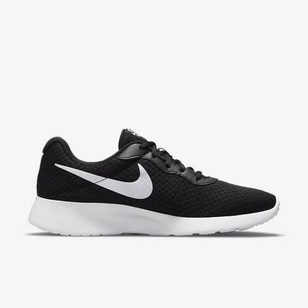 Women's Nike Tanjun Sneakers Black / White | NK237ZGJ