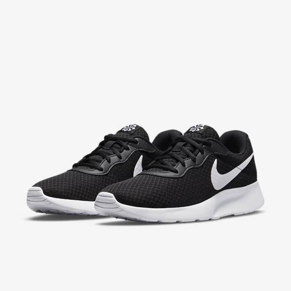 Women's Nike Tanjun Sneakers Black / White | NK237ZGJ