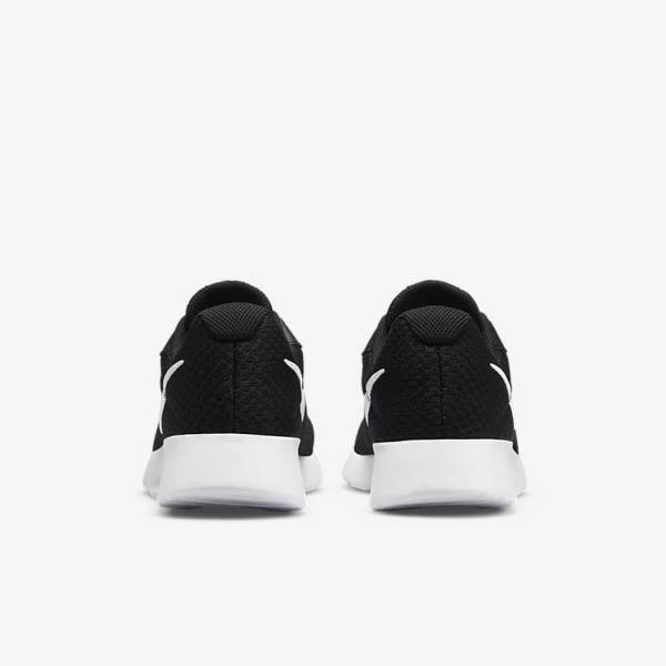 Women's Nike Tanjun Sneakers Black / White | NK237ZGJ