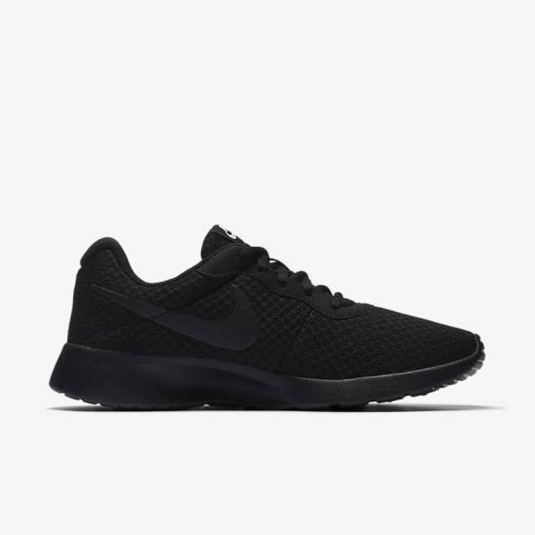 Women's Nike Tanjun Sneakers Black / White | NK729JQV